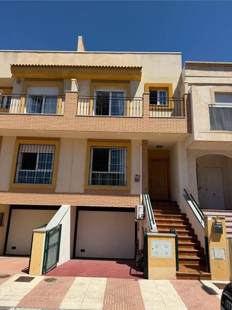 Exterior view of Single-family semi-detached for sale in Roquetas de Mar  with Air Conditioner, Heating and Terrace