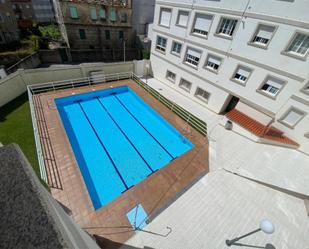 Swimming pool of Flat to rent in Sanxenxo  with Heating, Private garden and Parquet flooring