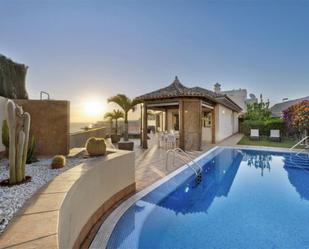 Vista exterior de Casa o xalet de lloguer en Santiago del Teide amb Aire condicionat, Jardí privat i Terrassa