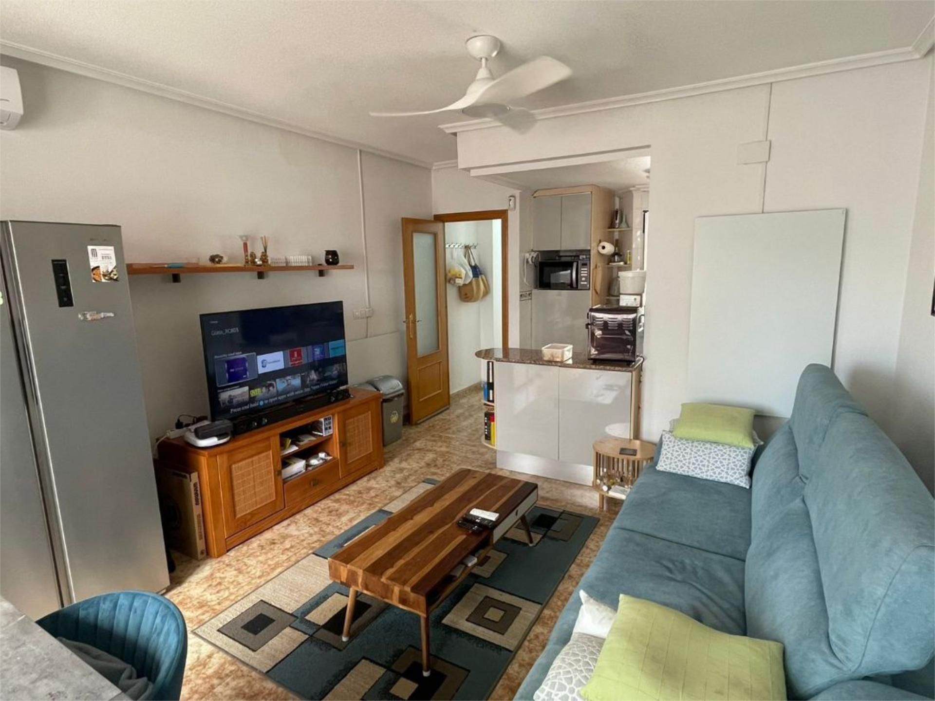 Living room of Flat for sale in Torrevieja  with Air Conditioner and Balcony