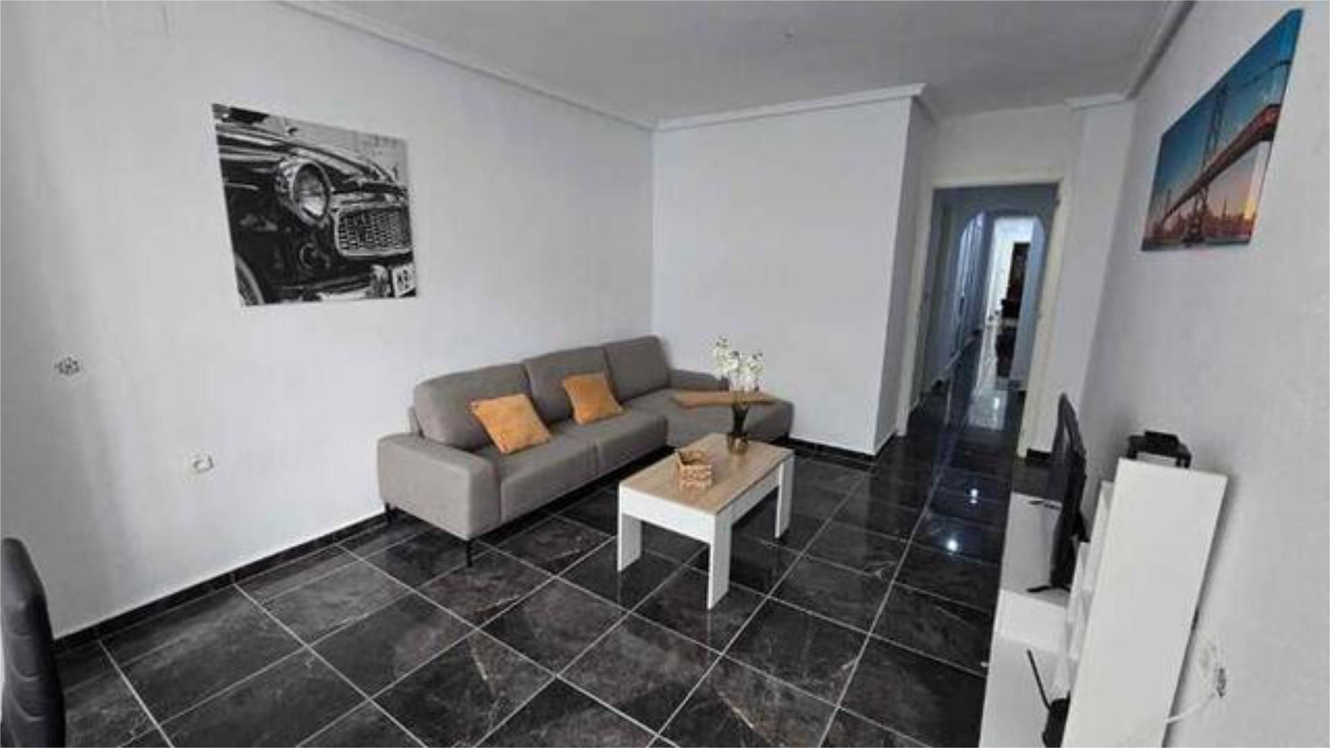Living room of Flat for sale in Torrevieja  with Private garden and Furnished