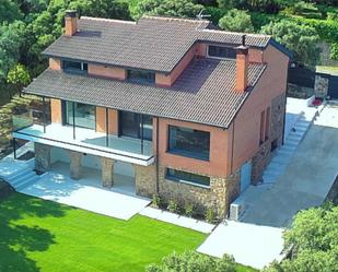 Vista exterior de Casa o xalet en venda en Venturada amb Aire condicionat, Terrassa i Balcó