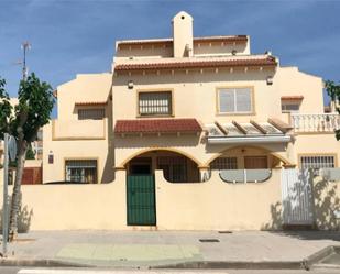 Exterior view of Duplex for sale in Pilar de la Horadada  with Air Conditioner, Terrace and Swimming Pool