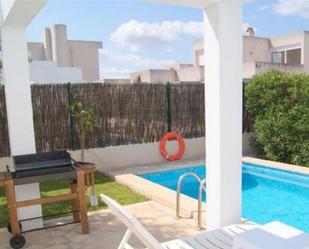 Piscina de Casa adosada de lloguer en Santa Margalida amb Calefacció, Jardí privat i Terrassa