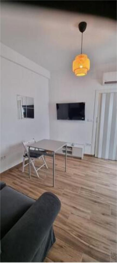 Sala d'estar de Apartament de lloguer en  Sevilla Capital amb Calefacció i Moblat