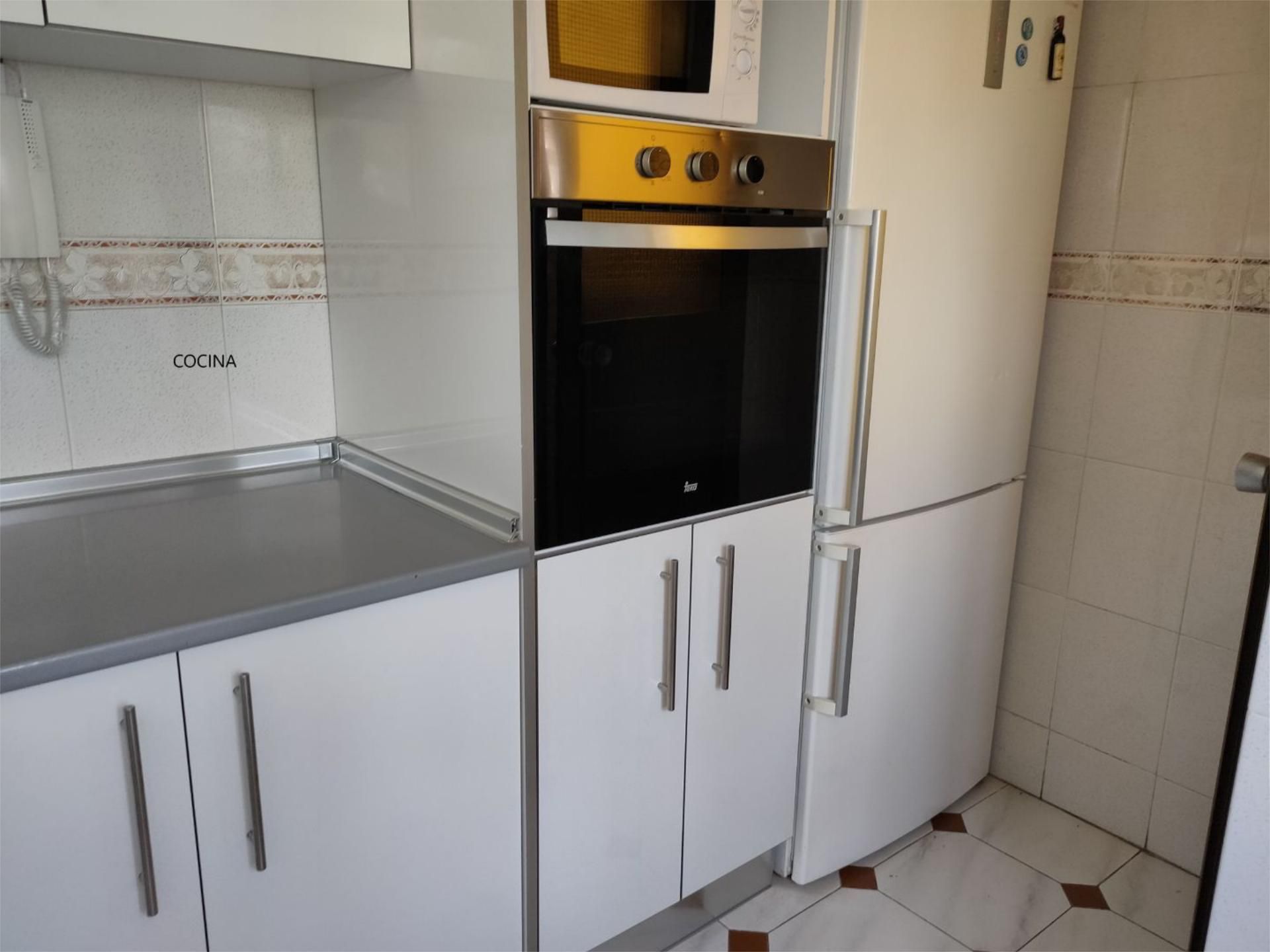 Kitchen of Flat to share in  Melilla Capital  with Air Conditioner, Heating and Terrace