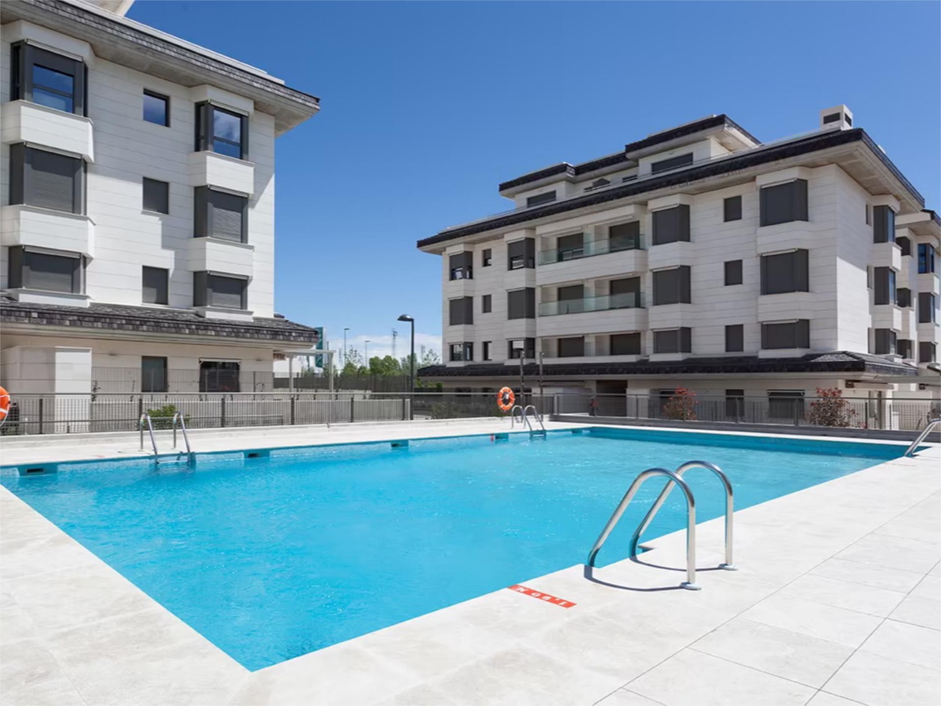 Swimming pool of Flat for sale in La Moraleja  with Air Conditioner, Heating and Private garden