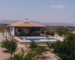 Piscina de Casa adosada en venda en Pliego amb Jardí privat, Terrassa i Traster