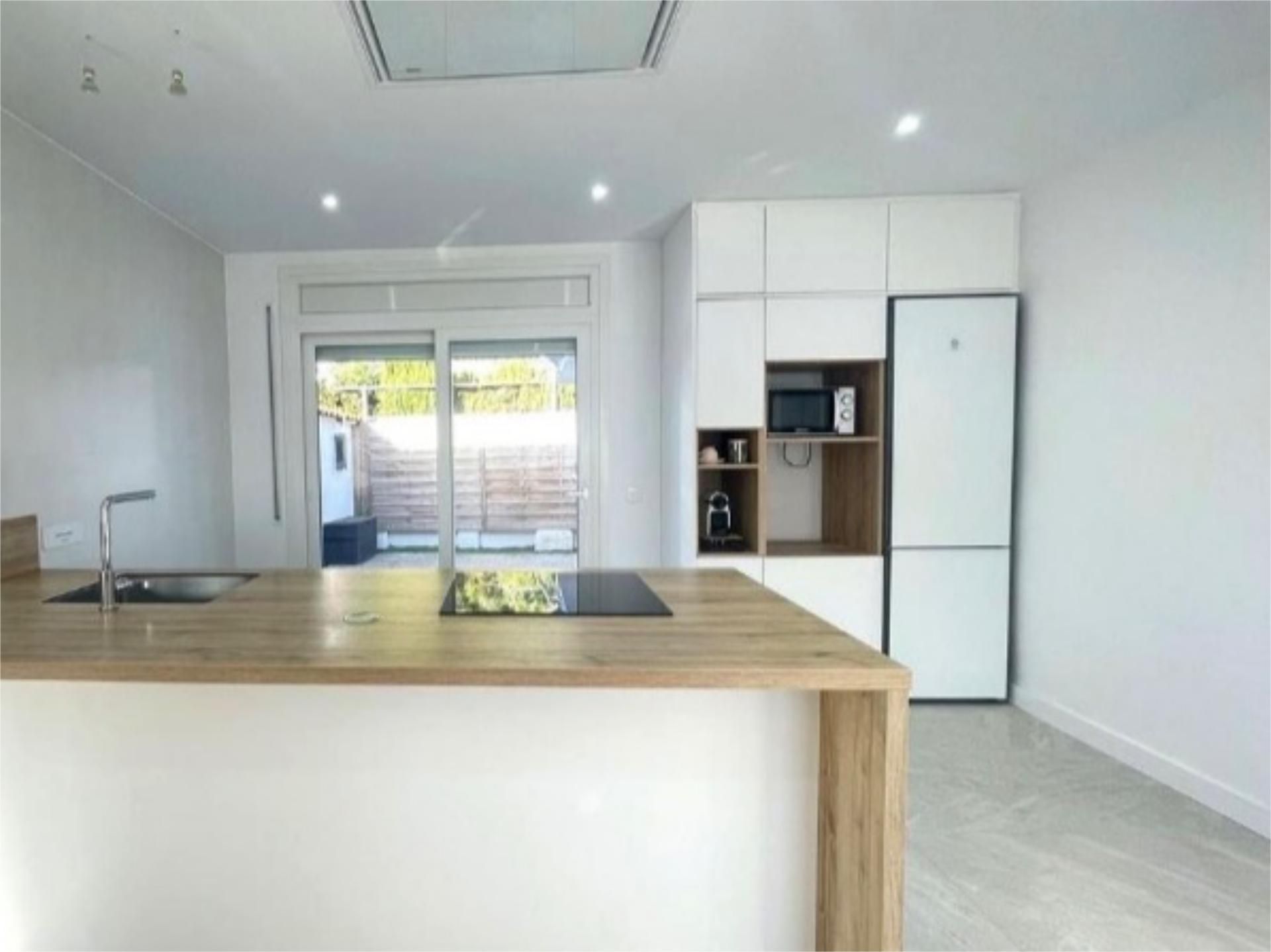 Kitchen of Flat for sale in L'Ametlla de Mar   with Air Conditioner, Heating and Private garden