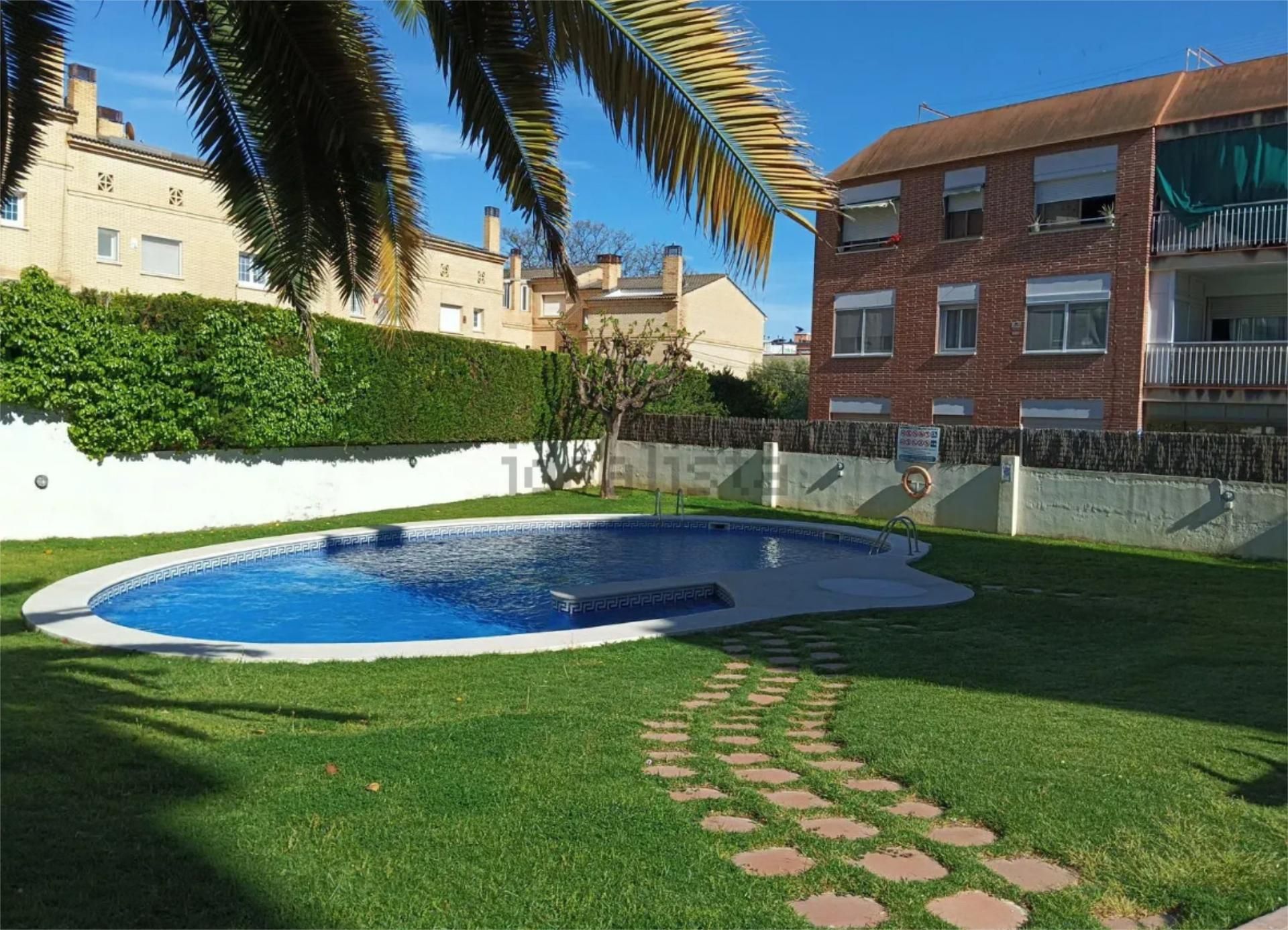 Swimming pool of Flat for sale in Castelldefels  with Air Conditioner, Heating and Private garden