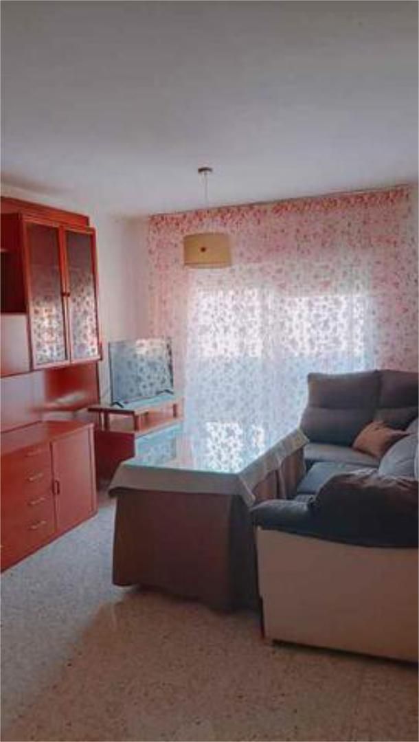 Sala d'estar de Pis de lloguer en  Huelva Capital amb Jardí privat, Terrassa i Moblat