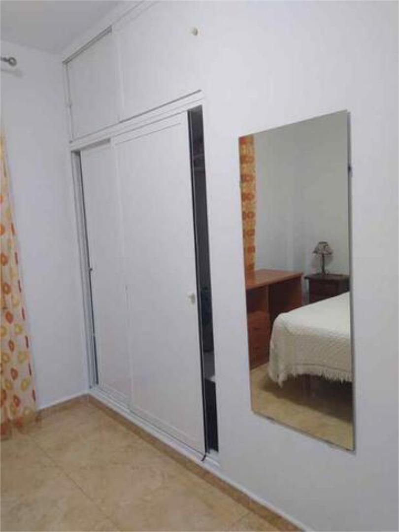 Dormitori de Apartament de lloguer en  Huelva Capital amb Calefacció i Moblat