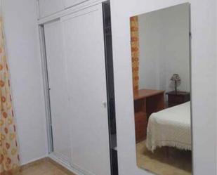 Dormitori de Apartament de lloguer en  Huelva Capital amb Calefacció i Moblat
