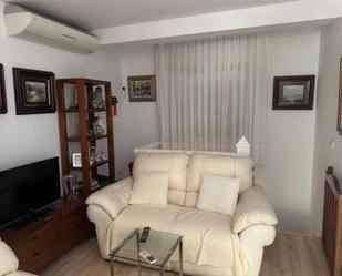 Sala d'estar de Casa adosada en venda en Guardamar del Segura amb Calefacció, Jardí privat i Terrassa