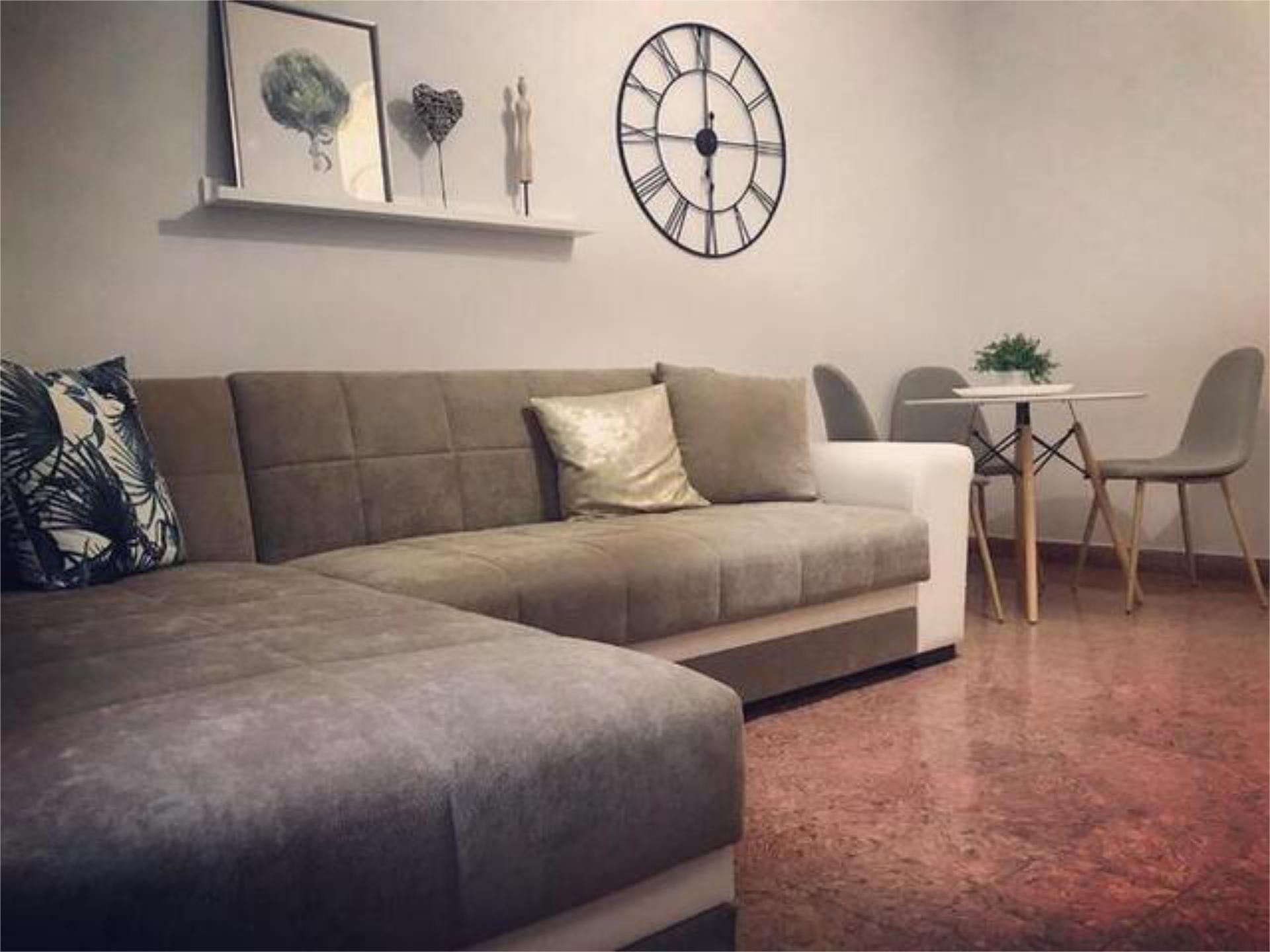 Sala d'estar de Pis de lloguer en Las Palmas de Gran Canaria amb Moblat