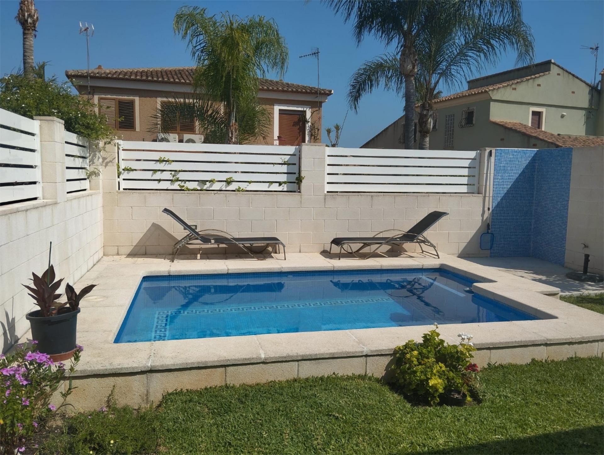 Swimming pool of Single-family semi-detached to share in Daimús  with Air Conditioner, Heating and Private garden