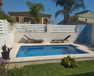 Piscina de Casa adosada per a compartir en Daimús amb Aire condicionat, Calefacció i Jardí privat