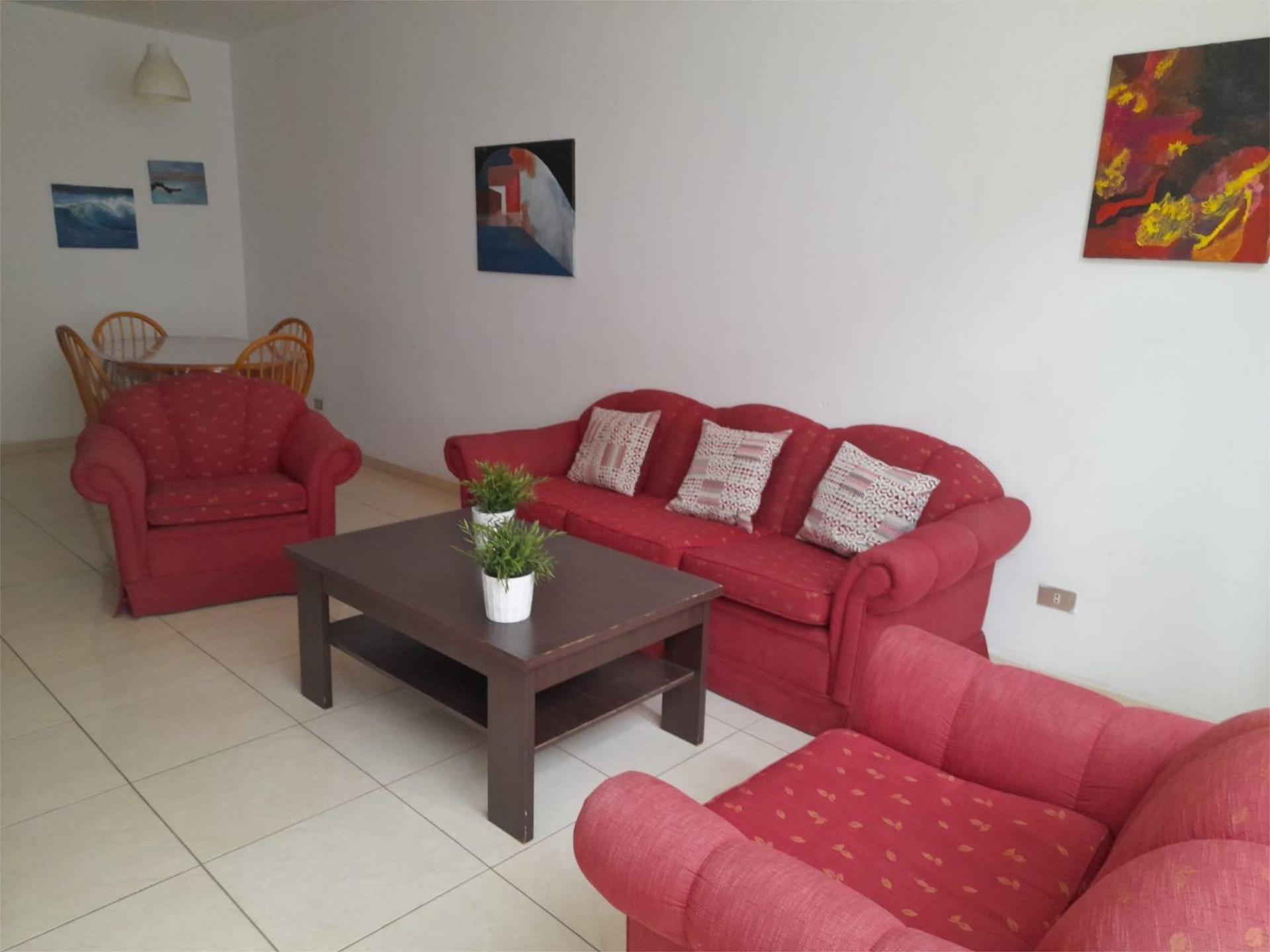 Sala d'estar de Pis per a compartir en Las Palmas de Gran Canaria amb Traster, Moblat i Aparcament comunitari
