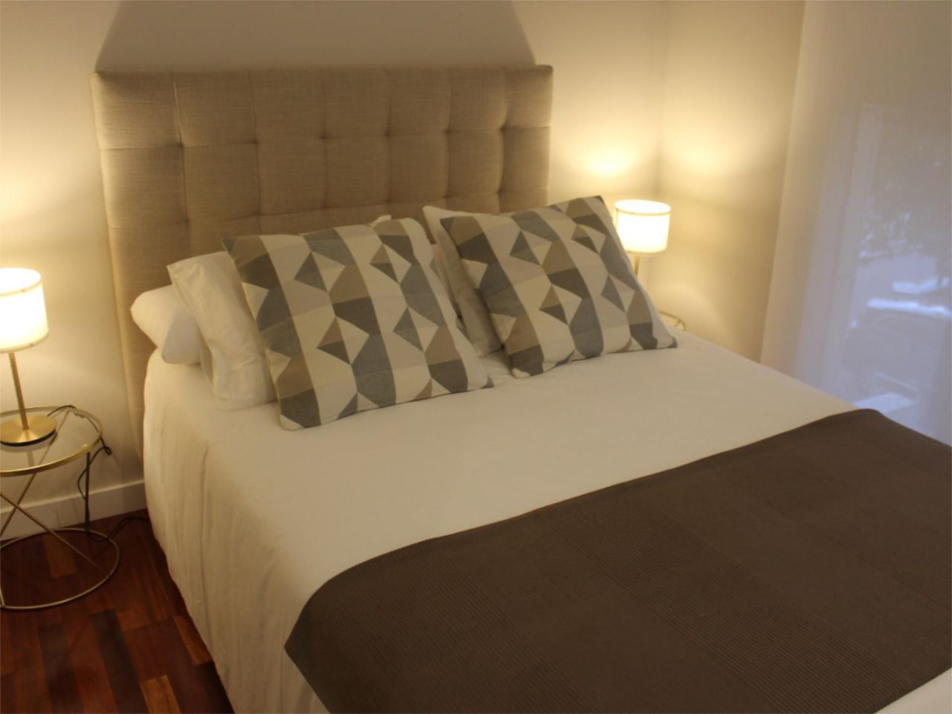 Dormitori de Apartament de lloguer en Badajoz Capital amb Aire condicionat