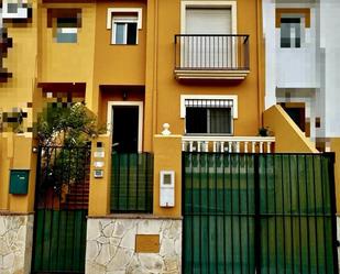 Exterior view of Single-family semi-detached for sale in Rincón de la Victoria  with Air Conditioner, Swimming Pool and Balcony