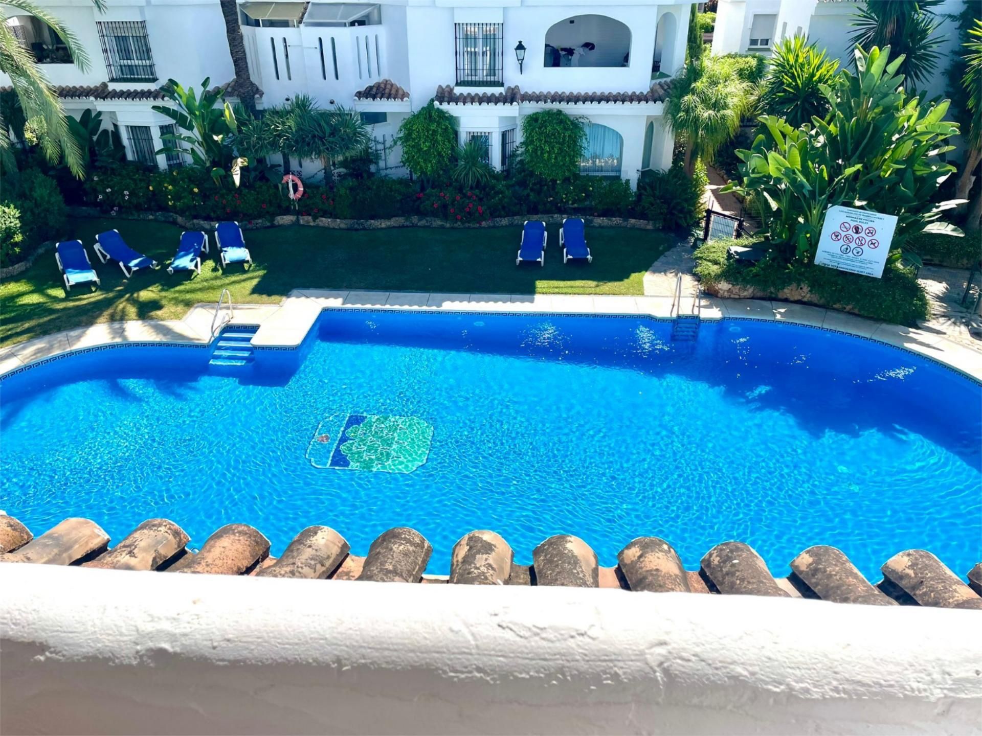 Swimming pool of Attic for sale in Marbella  with Air Conditioner