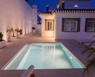 Swimming pool of Single-family semi-detached for sale in Almuñécar  with Air Conditioner, Heating and Private garden