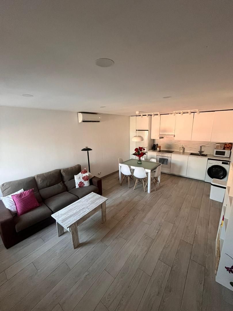 Living room of Planta baja to rent in Vallirana  with Air Conditioner and Oven