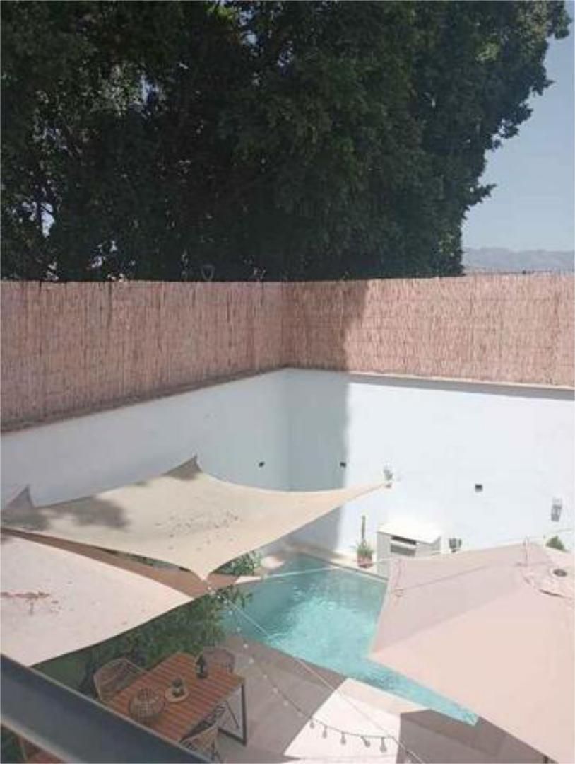 Piscina de Casa adosada de lloguer en Coín amb Calefacció, Jardí privat i Terrassa
