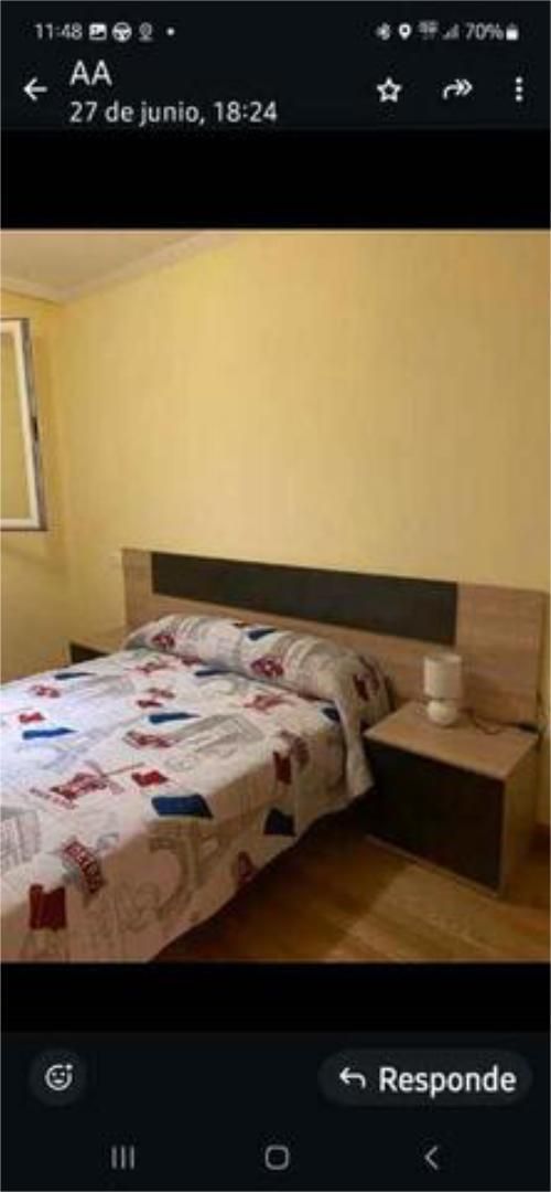 Dormitori de Apartament de lloguer en Calvarrasa de Abajo amb Terrassa i Piscina