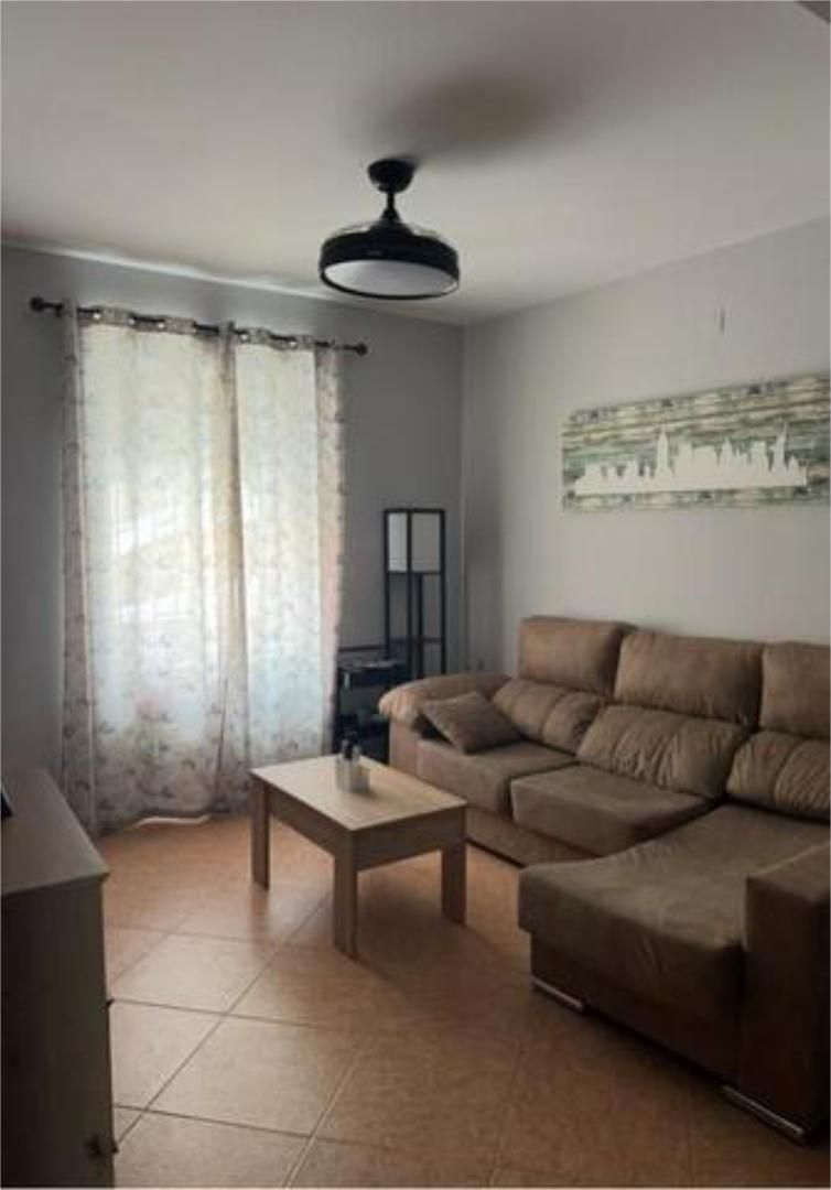 Sala d'estar de Casa o xalet en venda en Jódar amb Jardí privat, Terrassa i Traster