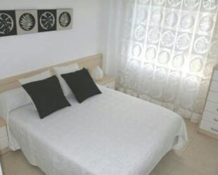 Dormitori de Apartament de lloguer en La Pobla de Farnals amb Aire condicionat, Jardí privat i Terrassa