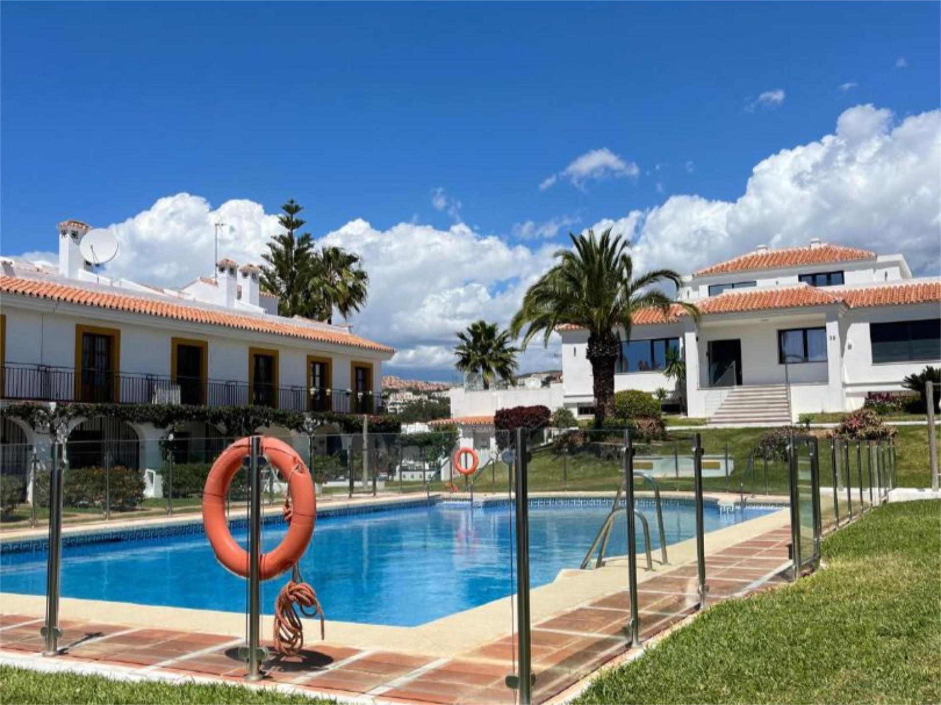 Exterior view of Single-family semi-detached for sale in Mijas  with Air Conditioner, Terrace and Swimming Pool