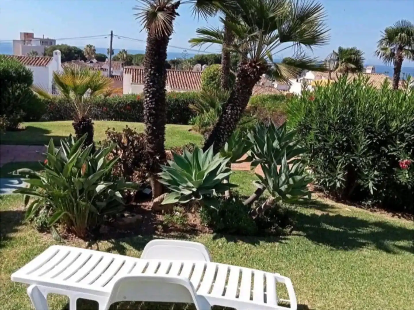 Garten von Einfamilien-Reihenhaus zum Verkauf in Mijas mit Klimaanlage, Terrasse und Schwimmbad