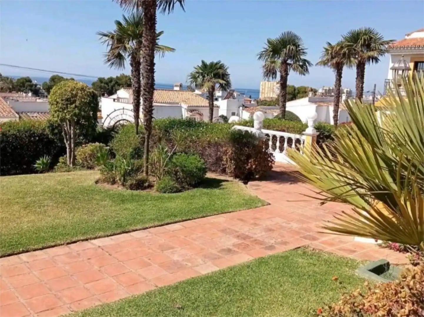 Garten von Einfamilien-Reihenhaus zum Verkauf in Mijas mit Klimaanlage, Terrasse und Schwimmbad