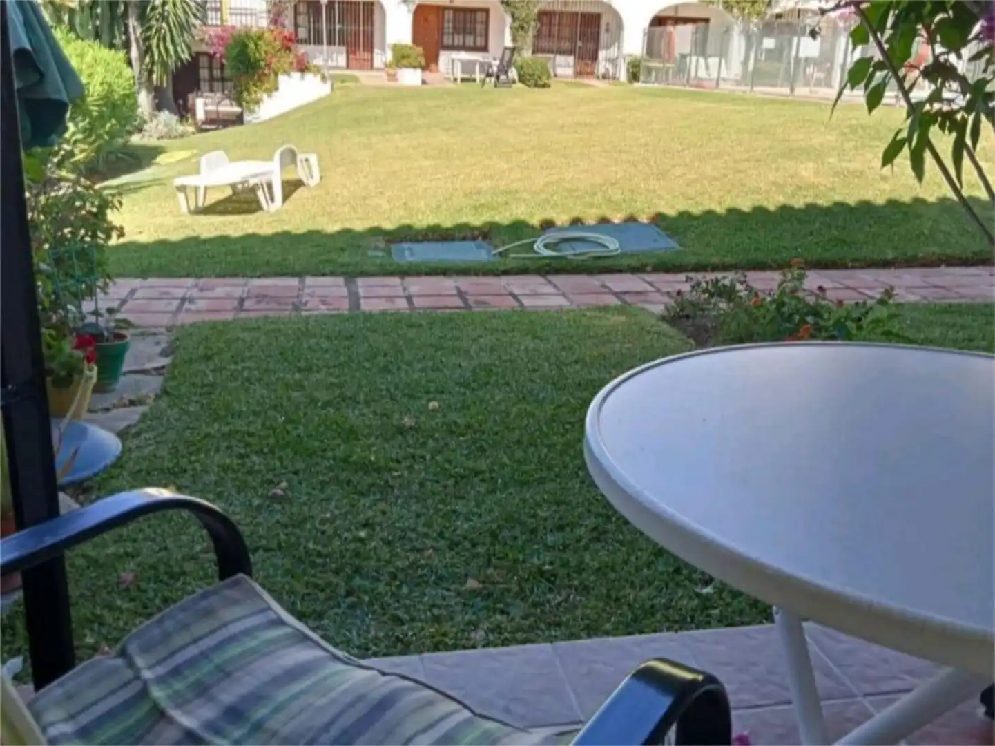Garten von Einfamilien-Reihenhaus zum Verkauf in Mijas mit Klimaanlage, Terrasse und Schwimmbad