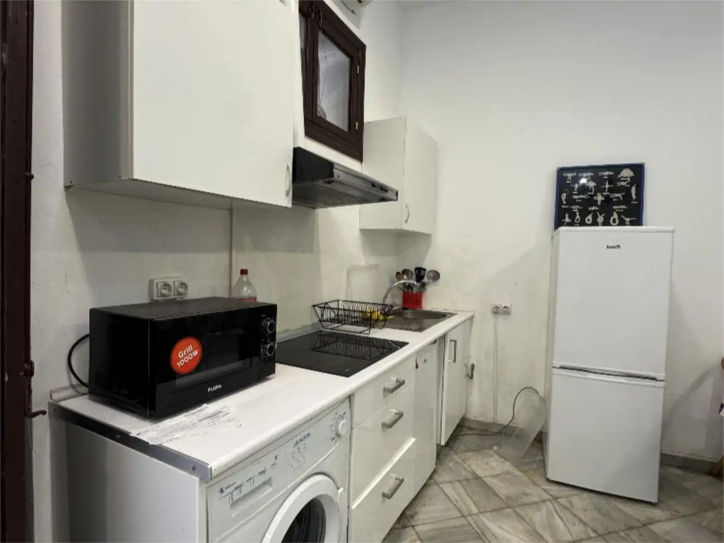 Apartament de lloguer a Calle Larga, 64, Casco Histórico - Ribera del Marisco Cuina de Apartament de lloguer en El Puerto de Santa María amb Aire condicionat, Calefacció i Moblat