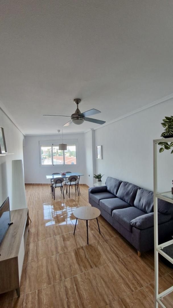 Living room of Flat to rent in Almoradí  with Parquet flooring, Swimming Pool and Furnished