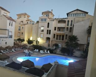 Exterior view of Flat for sale in Roquetas de Mar  with Terrace, Swimming Pool and Furnished