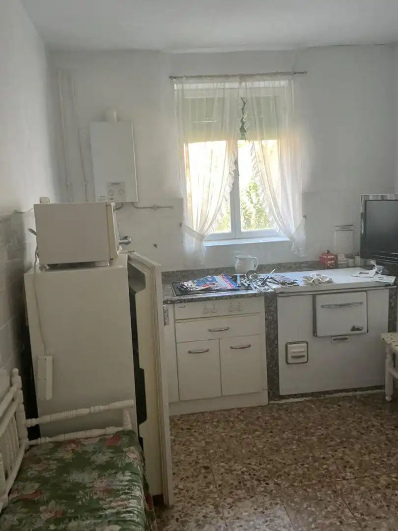 Casa adosada en venda a Calle Piedad, 40, Herrera de Pisuerga Cuina de Casa adosada en venda en Herrera de Pisuerga amb Jardí privat, Traster i Moblat