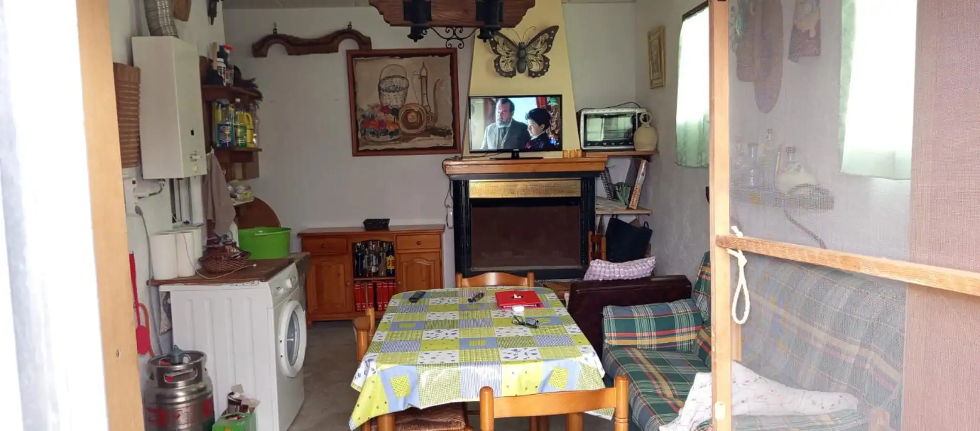 Sala de estar de Planta baja en venta en Benamaurel con Calefacción, Terraza y Amueblado