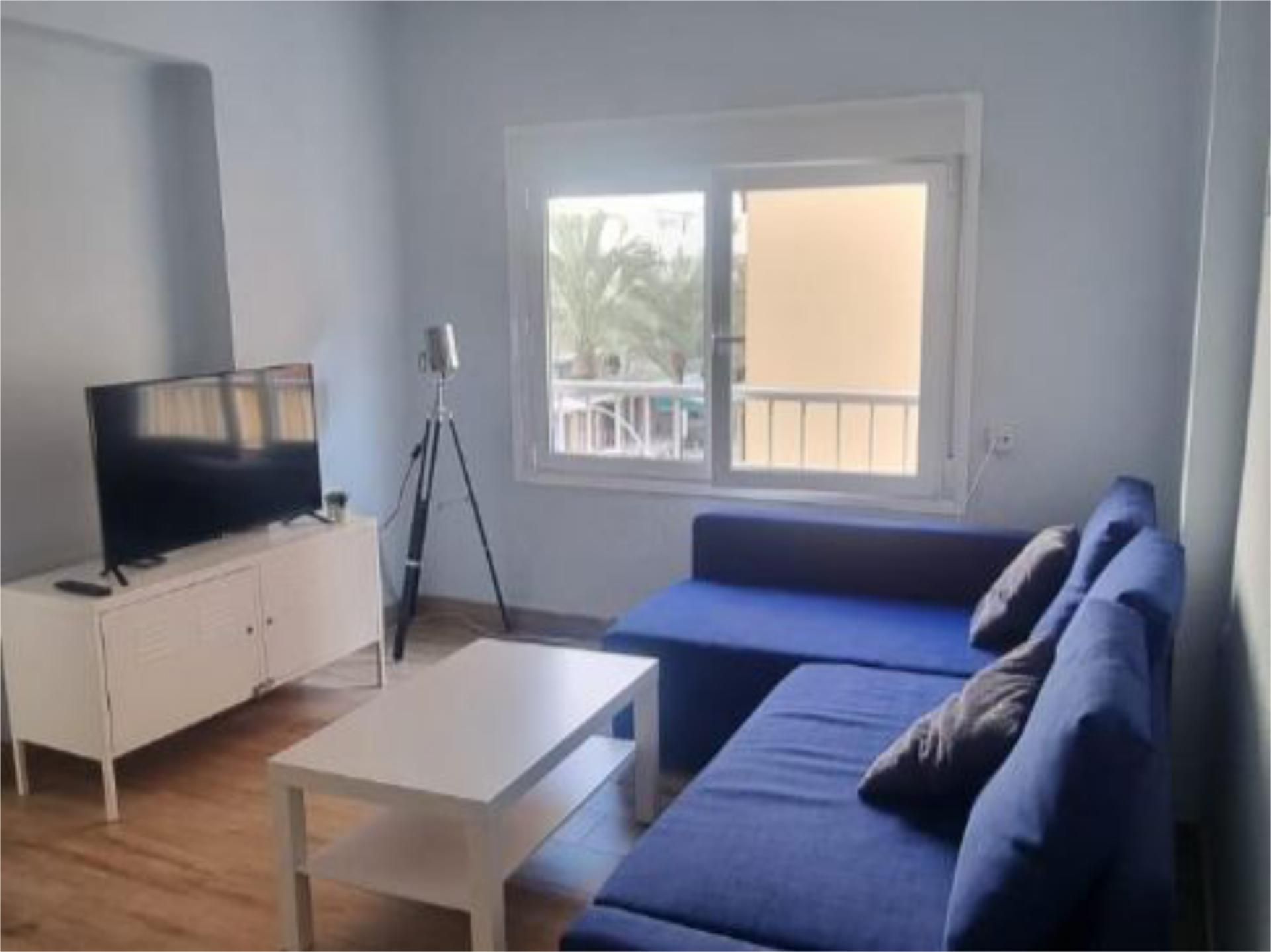 Sala d'estar de Pis de lloguer en Cullera amb Aire condicionat i Balcó