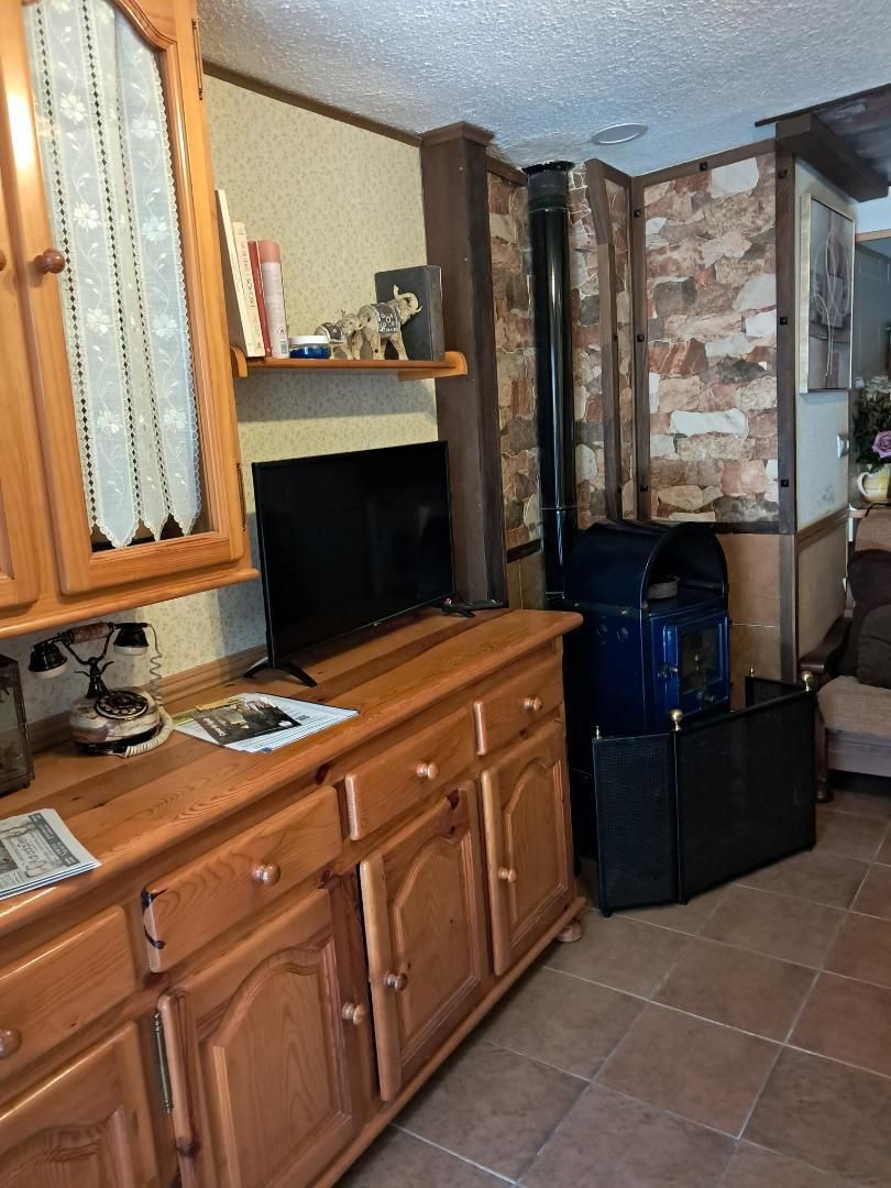 Sala d'estar de Casa adosada de lloguer en La Adrada  amb Aire condicionat, Calefacció i Moblat