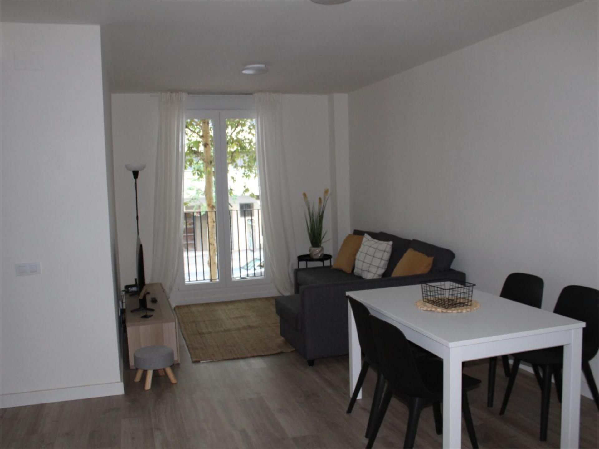 Living room of Flat to share in  Lleida Capital  with Air Conditioner, Parquet flooring and Furnished
