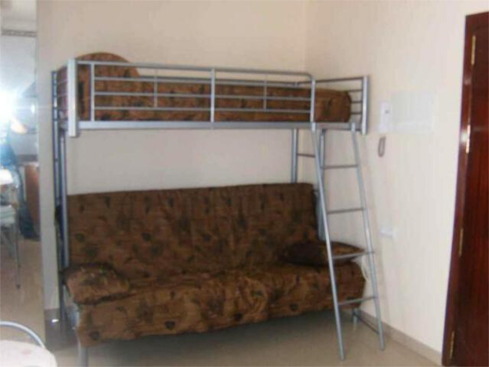 Dormitori de Apartament de lloguer en Morón de la Frontera