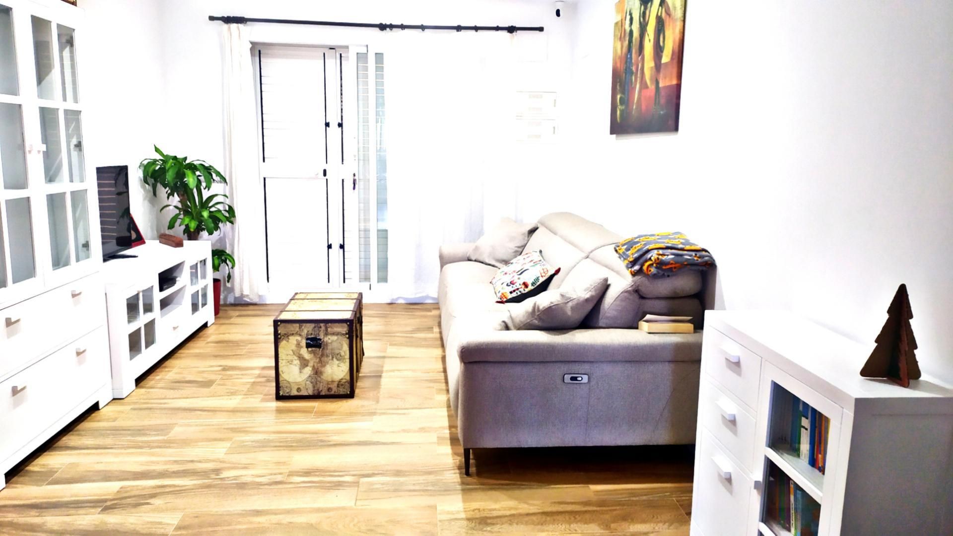 Sala d'estar de Casa adosada en venda en Almazora / Almassora amb Aire condicionat i Terrassa