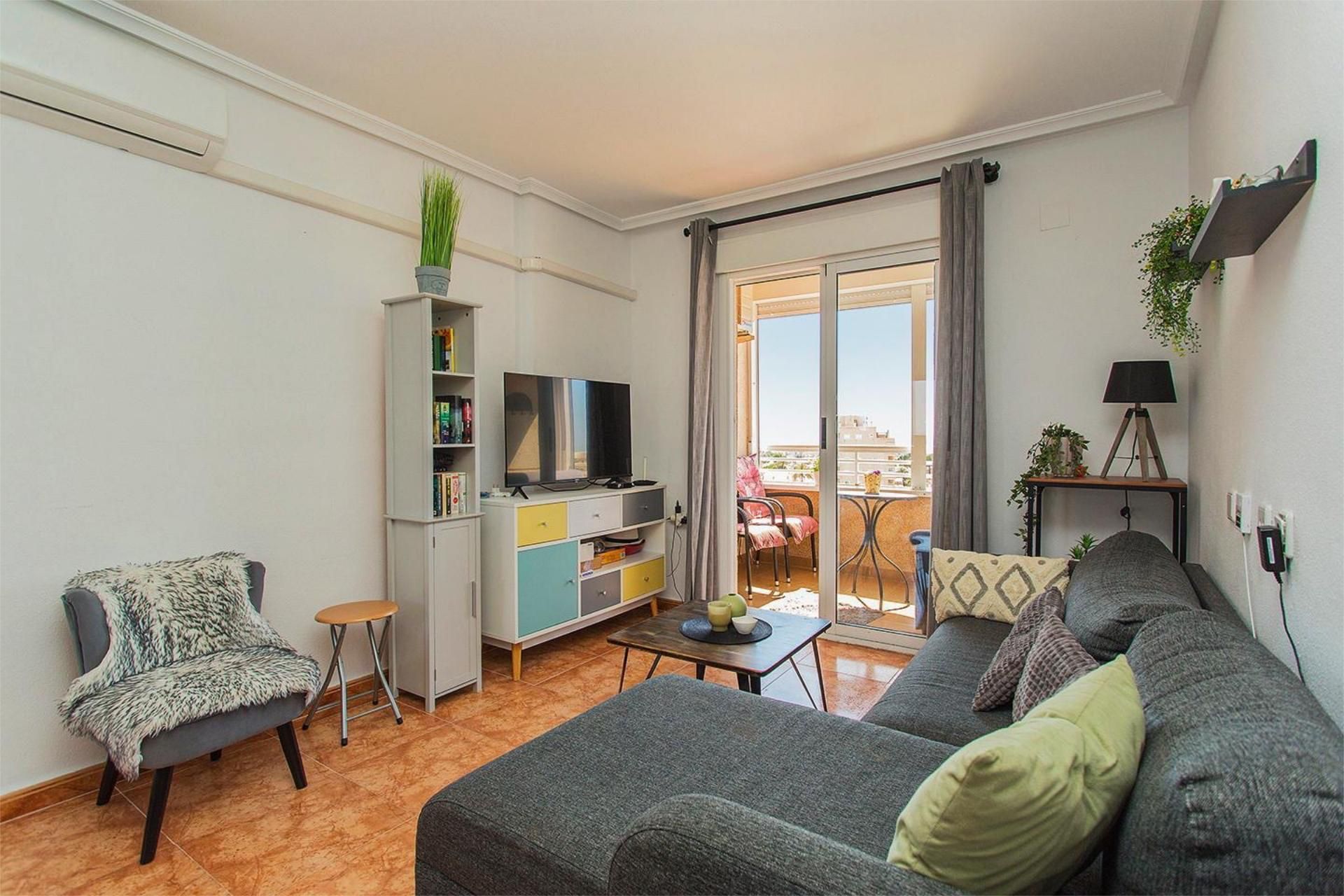 Living room of Flat for sale in Torrevieja  with Air Conditioner, Terrace and Swimming Pool