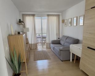 Sala d'estar de Apartament en venda en Mogán amb Aire condicionat, Jardí privat i Terrassa