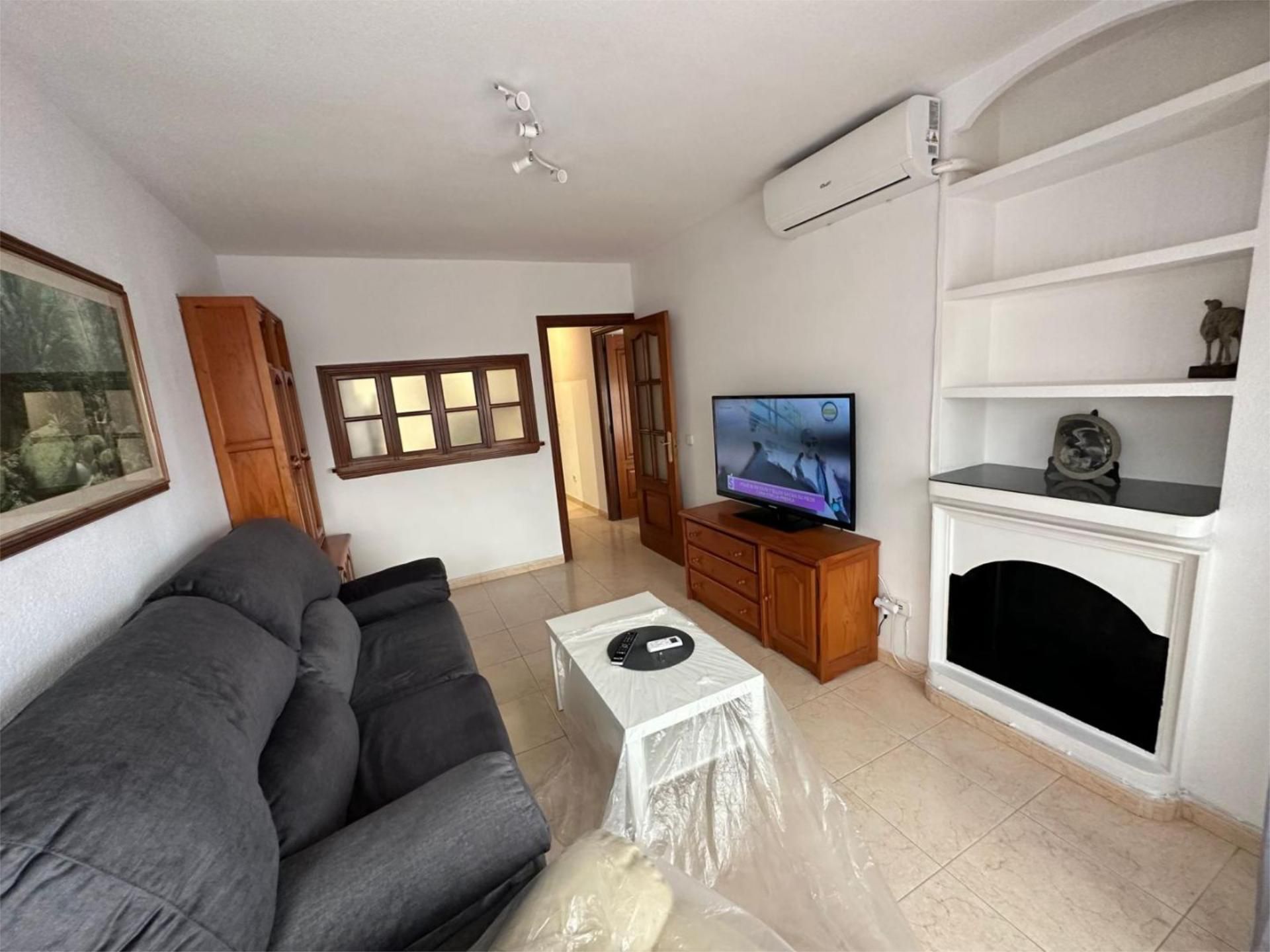 Living room of Flat for sale in  Melilla Capital  with Air Conditioner, Furnished and Video intercom