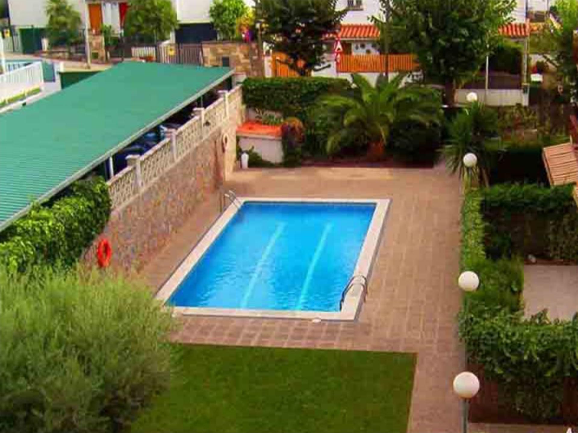 Swimming pool of Flat for sale in El Masnou  with Air Conditioner, Terrace and Swimming Pool