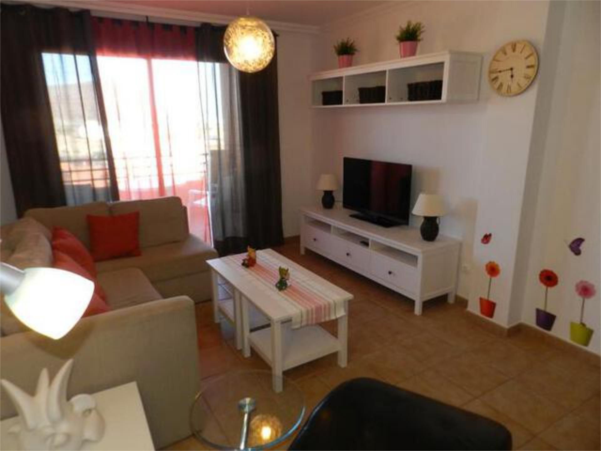 Sala d'estar de Apartament de lloguer en Granadilla de Abona amb Jardí privat, Terrassa i Piscina